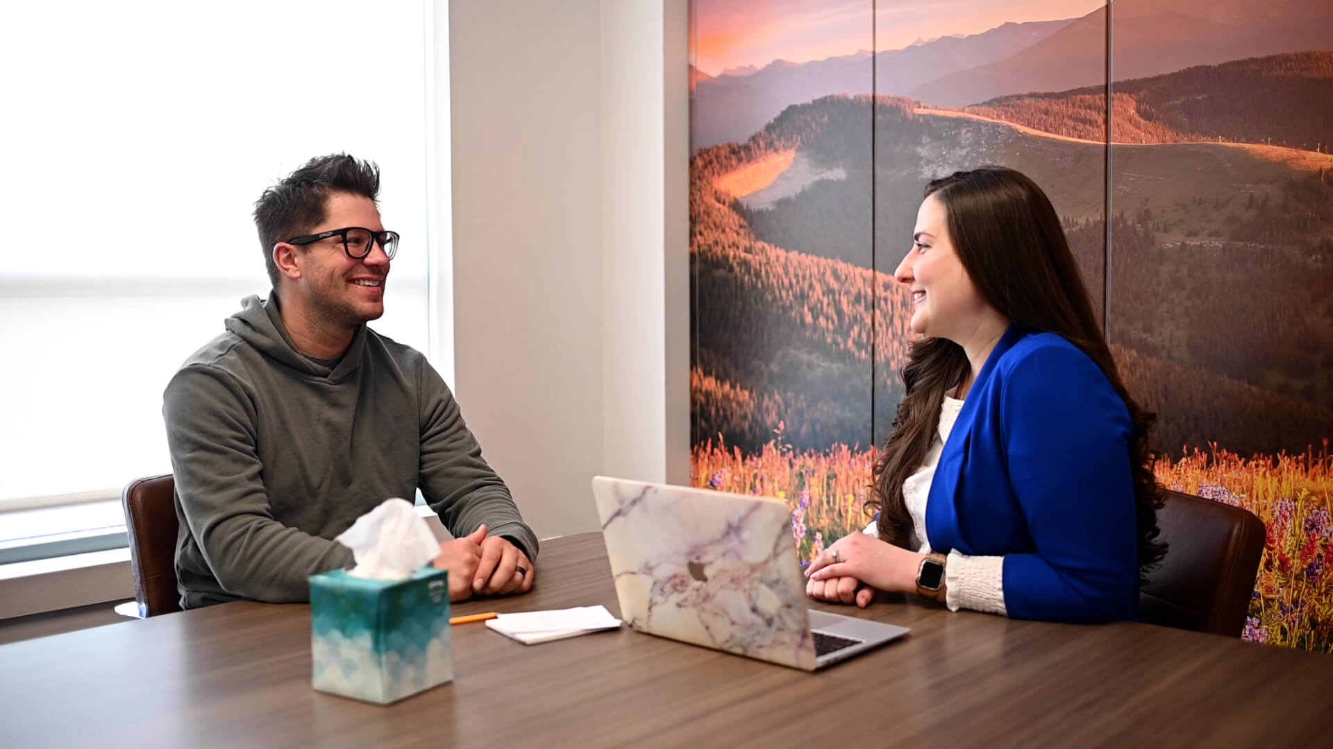 In the lobby of Vail Health, a prominent painting graces the wall, exuding an air of sophistication and artistic allure.