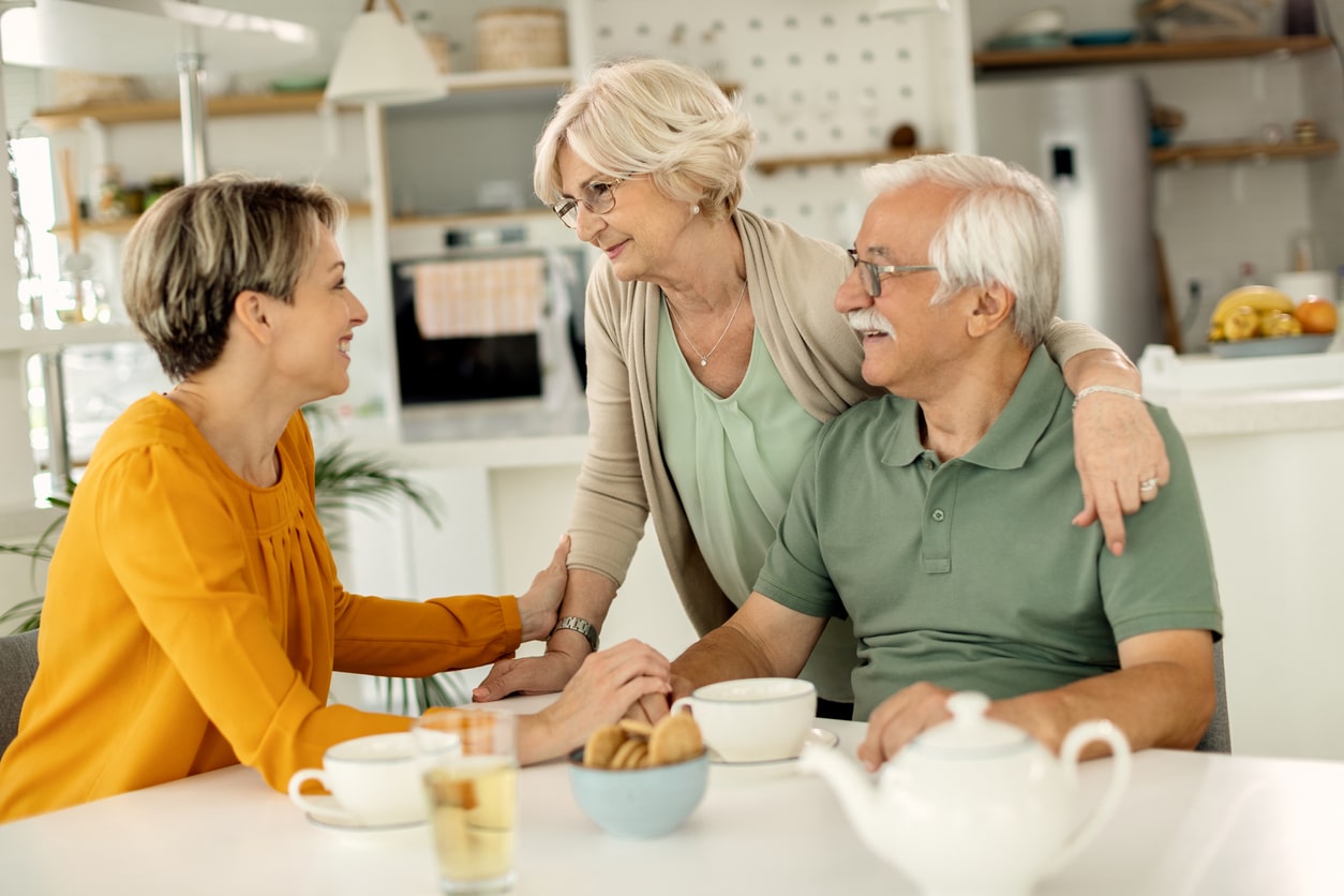 Family discussing advance directive planning at home.